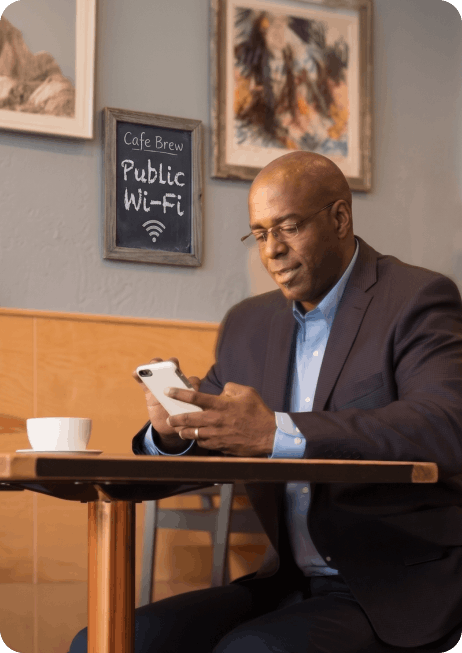 A man connects to public Wi-Fi in reseller spot